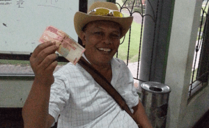 A happy Deddy shows us the money ...